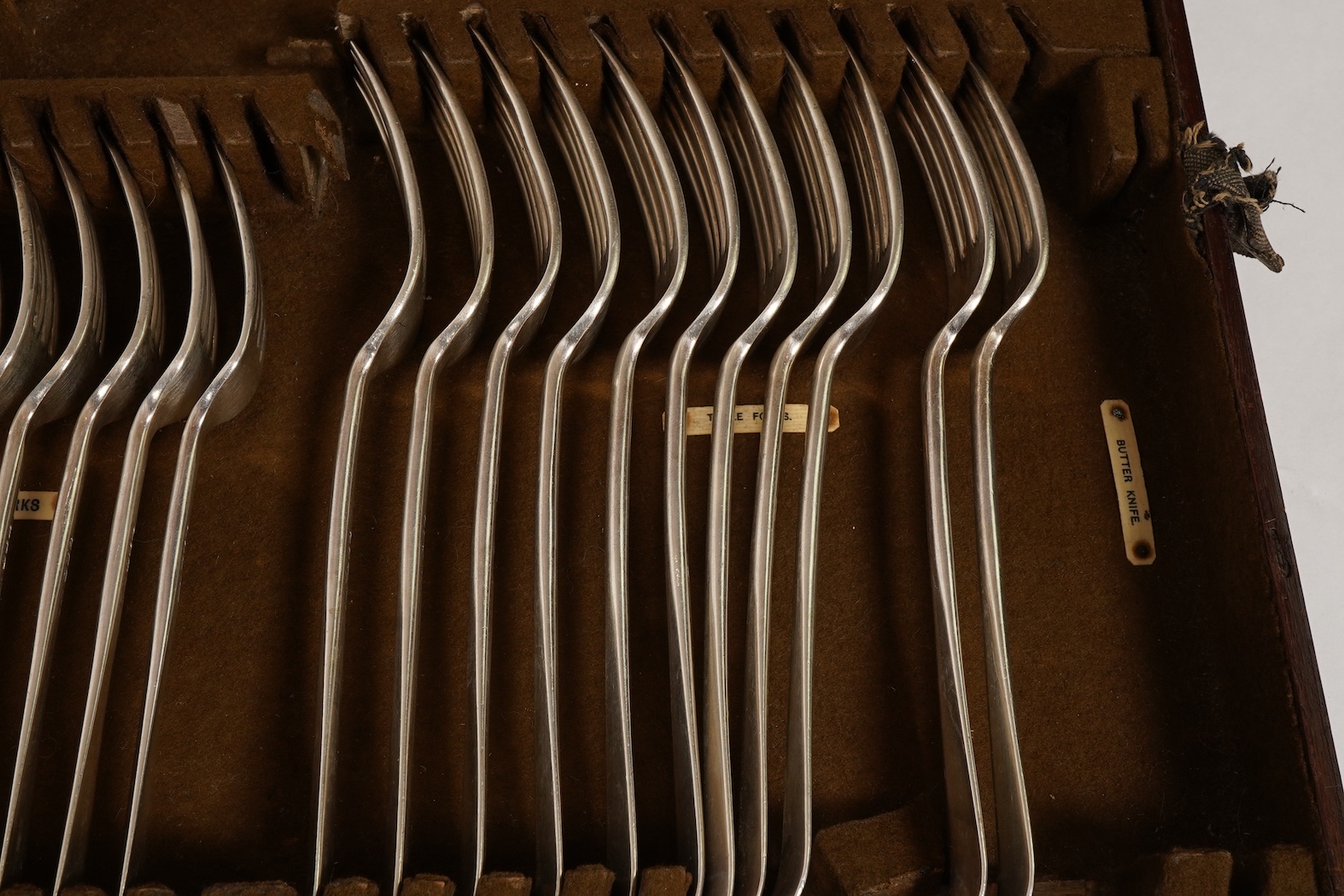 A George V canteen of silver Hanoverian rat tail flatware, by Mappin & Webb